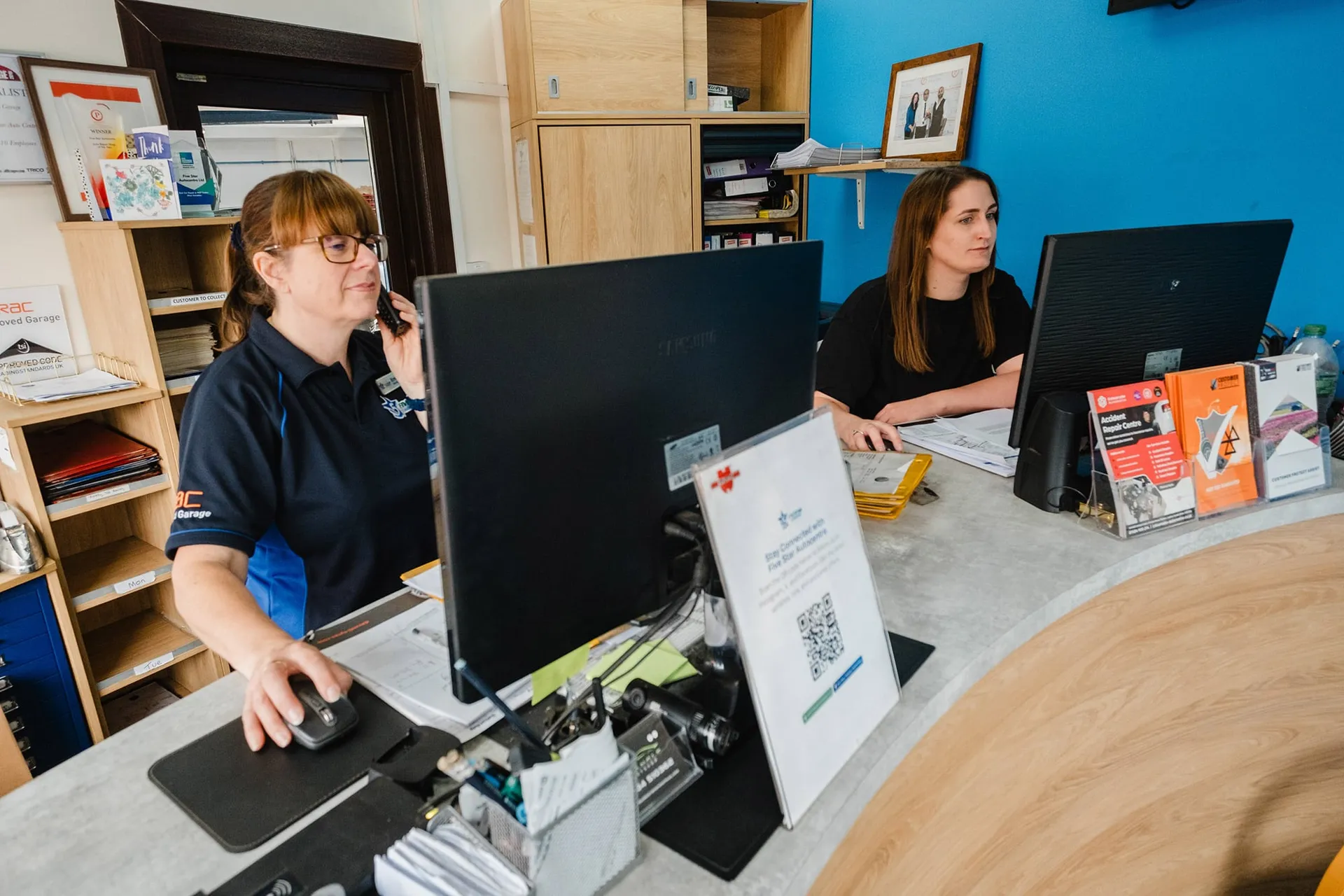 a busy garage reception desk
